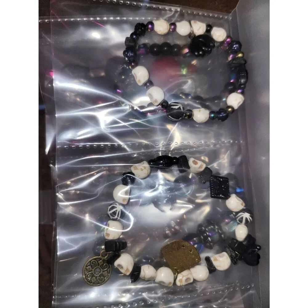 Cool galaxy metallic or stone skull charm beaded bracelet